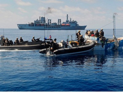 Royal Marines raiding craft from Fleet Contingency Troop (FCT), Fleet Protection Group Royal Marines (FPGRM) boarding and searching a Somalian Pirate Vessel.  RFA Fort Victoria is pictured in the background.  The Pirates were later taken onboard RFA Fort Victoria for repatriation and the vessel was destroyed.