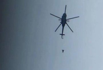 2016824113715620352061_Syrian-helicopter-dropping-barrel-bombs-on-Syrian-