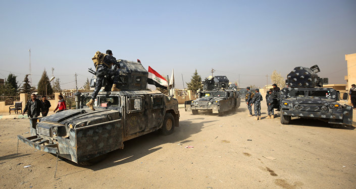Mosul mezzi polizia irachena AFP
