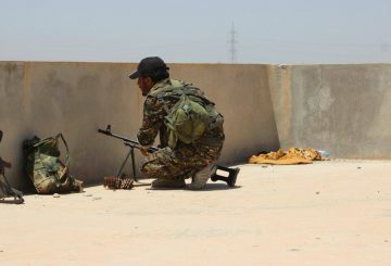 SDF-fighter-on-Raqqa-rooftop