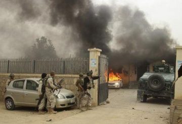 Afghan security forces arrive at the site of an attack in Kunduz province October 27, 2014. REUTERS/Stringer