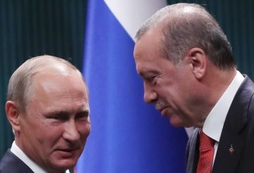 Turkish President Recep Tayyip Erdogan (R) and Russian President Vladimir Putin (L) shake hands after a joint press conference following their meeting at the Presidential Complex in Ankara on September 28, 2017. The Russian President and his Turkish counterpart on September 28 agreed to push for the creation of a "de-escalation" zone in Syria's key northern province of Idlib to help end the civil war. / AFP PHOTO / ADEM ALTAN