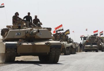 Iraqi forces drive towards Kurdish peshmerga positions on October 15, 2017, on the southern outskirts of Kirkuk. The presidents of Iraq and Iraqi Kurdistan held talks to defuse an escalating crisis, after a deadline for Kurdish forces to withdraw from disputed positions was extended by 24 hours. / AFP PHOTO / AHMAD AL-RUBAYE (Photo credit should read AHMAD AL-RUBAYE/AFP/Getty Images)