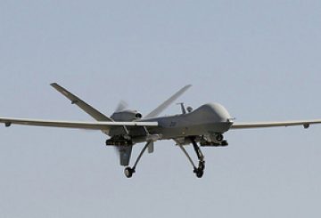 Date: 01-Nov-2010 Image shows: A 39 Squadron Reaper is ready for another mission over Afghanistan and sits on the pan armed with 2 hellfire and a 500lb Paveway under each wing at Kandahar Airfield. Title - 39 Squadron Reaper Image by Sergeant Corrine Buxton RAF