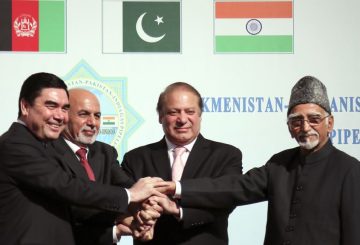 Leaders from Afghanistan, India and from left: Turkmen President Gurbanguly Berdymukhamedov shakes hands with the Afghanistan President Ashraf Ghani, Pakistani Prime Minister Mohammad Nawaz Sharif and Indian vice president Hamid Ansari during Sunday, Dec. 13, 2015 ceremony in Ashgabat, Turkmenistan. Pakistan have joined the president of Turkmenistan in breaking ground on a new pipeline intended to deliver natural gas from the energy-rich former Soviet republic to their three countries. The 1,800-kilometer (1,080-mile) TAPI pipeline is intended to carry gas through the Afghan cities of Herat and Kandahar and end up in the India-Pakistan border town of Fazilka. (AP Photo/ Alexander Vershinin)