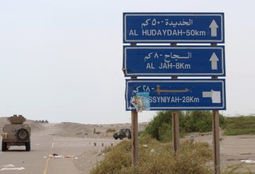 A picture taken during a tour organised by Yemeni loyalist fighters backed by Saudi and Emirati forces on June 2, 2018 shows an armoured vehicle of the pro-government forces on a main road in the Hodeida province, 50 kilometres from the port city of Hodeida, which the Iran-backed Huthi insurgents seized in 2014. Saudi-backed pro-government forces in Yemen are preparing to surround the key Red Sea port of Hodeida in a bid to force Huthi rebels to surrender it without a fight, according to military sources. / AFP PHOTO / Saleh Al-OBEIDI