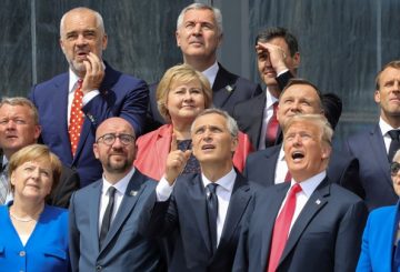 (First row L-R) German Chancellor Angela Merkel, Belgium's Prime Minister Charles Michel, NATO Secretary General Jens Stoltenberg, US President Donald Trump, Britain's Prime Minister Theresa May (second row L-R) Denmark's Prime Minister Lars Lokke Rasmussen, Norway's Prime Minister Erna Solberg, Poland's President Andrzej Duda, French President Emmanuel Macron (third row) Albania's Prime Minister Edi Rama, Czech Republic President Milos Zeman and Spain's Prime Minister Pedro Sanchez pose for a family picture ahead of the opening ceremony of the NATO (North Atlantic Treaty Organization) summit, at the NATO headquarters in Brussels, Belgium July 11, 2018. Ludovic Marin/Pool via REUTERS TPX IMAGES OF THE DAY - RC1399E0AA40