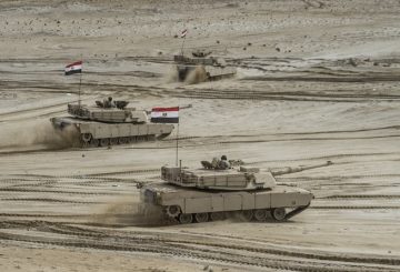 Egyptian tanks take part in the Arab Shield joint military exercises at Mohamed Naguib military base in El-Hamam near the Mediterranean coast, about 240 kilometres northwest of the capital Cairo on November 15, 2018. - Forces from Saudi Arabia, Egypt, the UAE, Kuwait, Bahrain and Jordan are taking part in the maneuvers. (Photo by Khaled DESOUKI / AFP)