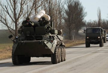ROSTOV-ON-DON REGION, RUSSIA - FEBRUARY 19, 2022: An armoured vehicle drives by. On February 21, Russia recognized the Donetsk and Lugansk People's Republics, the friendship, cooperation and mutual assistance treaties signed with their leaders. Stringer/TASS Ðîññèÿ. Ðîñòîâñêàÿ îáëàñòü. Âîåííàÿ òåõíèêà íà äîðîãå. Ïðåçèäåíò Ðîññèè Âëàäèìèð Ïóòèí 21 ôåâðàëÿ çàÿâèë î ïðèçíàíèè ñóâåðåíèòåòà Äîíåöêîé è Ëóãàíñêîé íàðîäíûõ ðåñïóáëèê, ñ èõ ëèäåðàìè áûëè ïîäïèñàíû äîãîâîðû î äðóæáå, ñîòðóäíè÷åñòâå è âçàèìíîé ïîìîùè. Ñòðèíãåð/ÒÀÑÑ